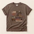 I Pay Rent My Cat Owns The Place graphic tee in Espresso, folded flat lay