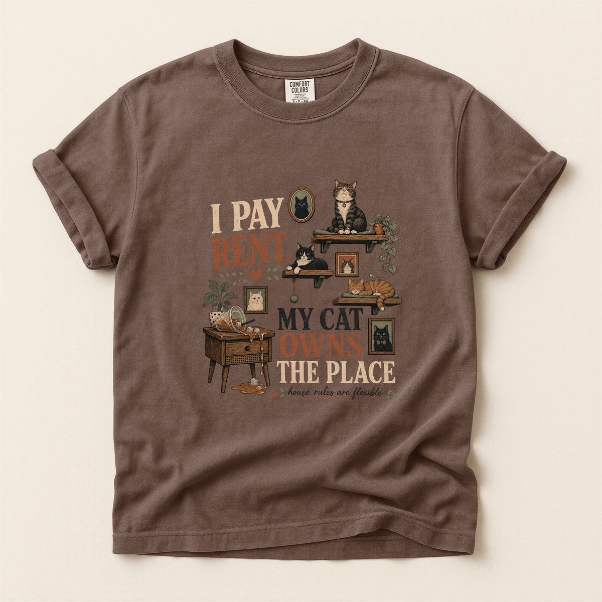 I Pay Rent My Cat Owns The Place graphic tee in Espresso, folded flat lay