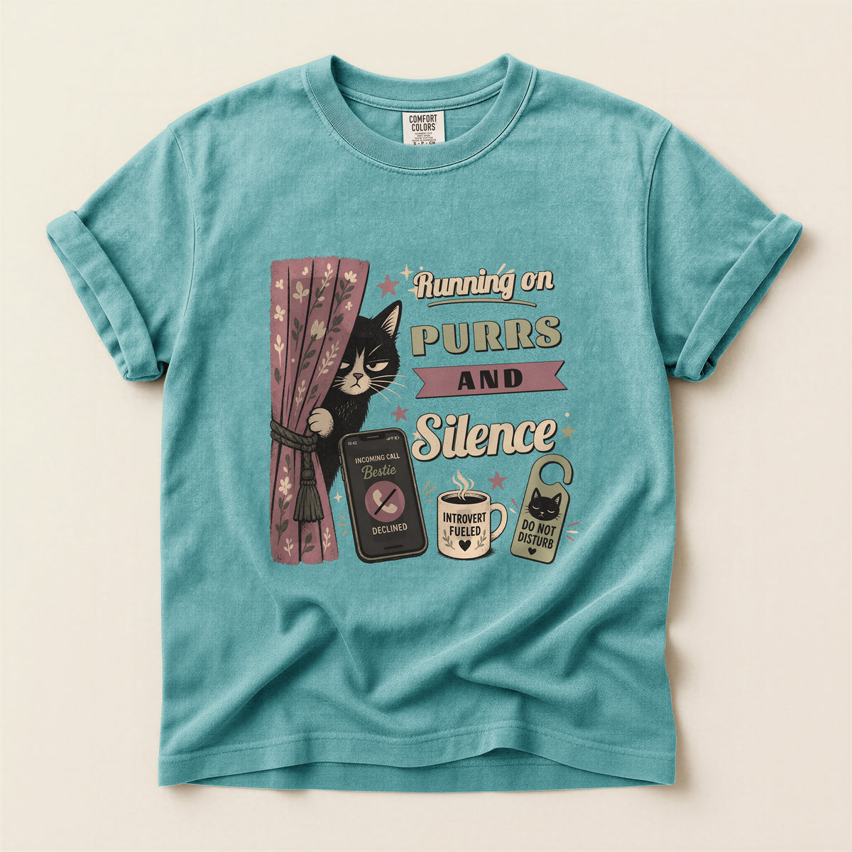 Running on Purrs and Silence graphic tee in Seafoam, flat lay