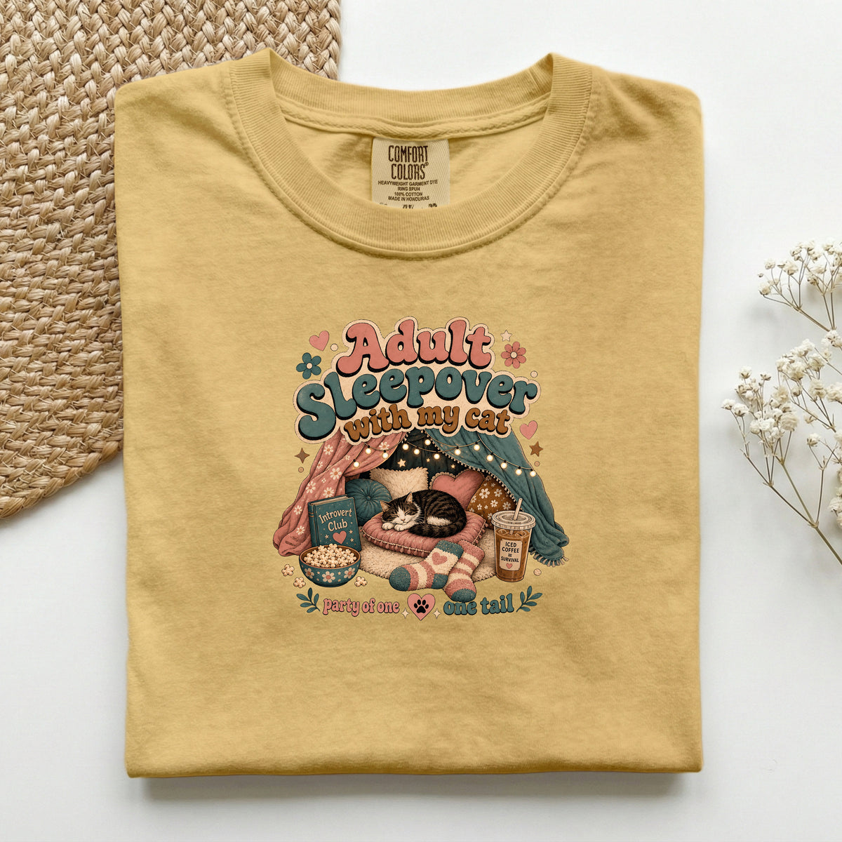 Adult Sleepover With My Cat graphic tee in Mustard, folded flat lay