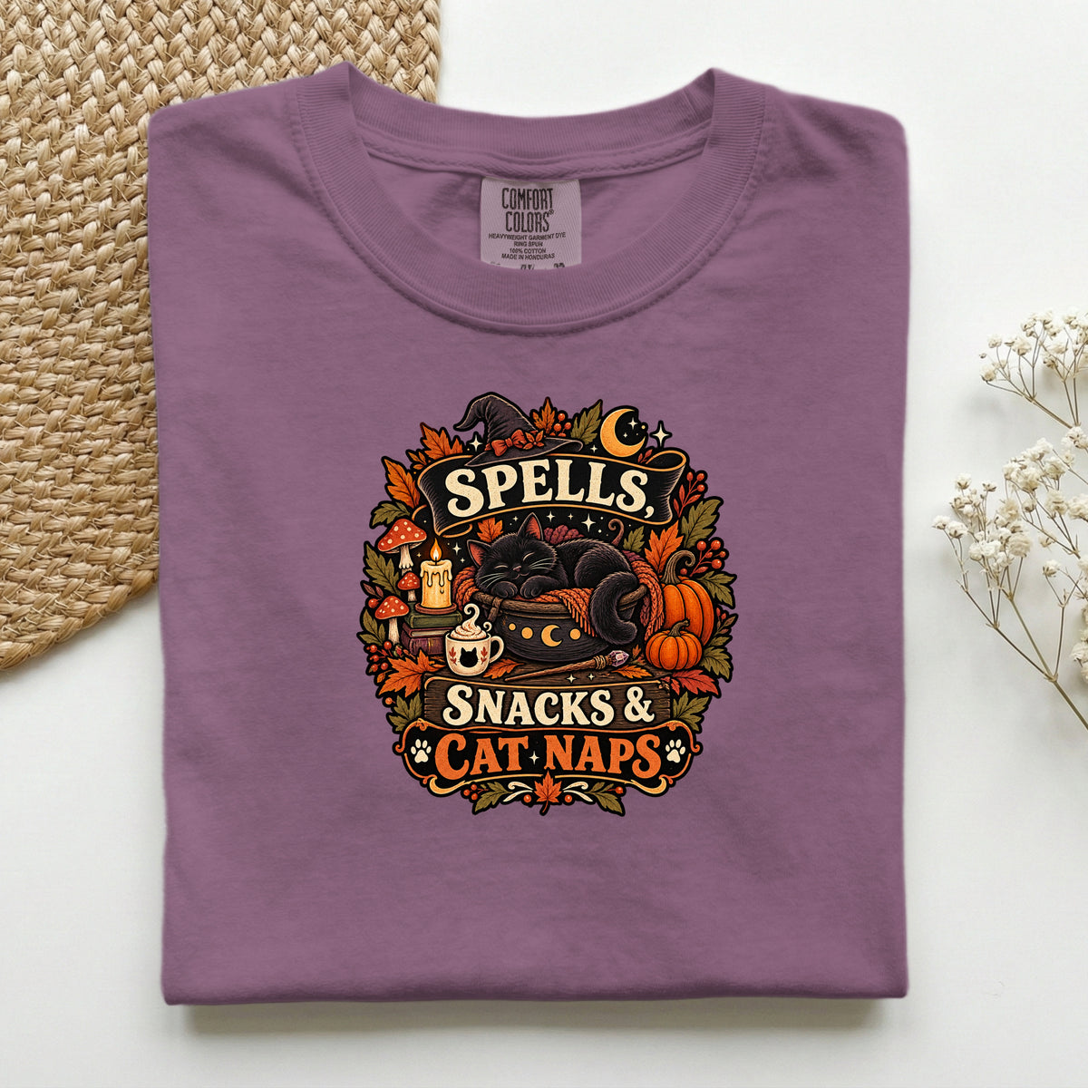 Spells Snacks & Cat Naps graphic tee in Berry, folded flat lay