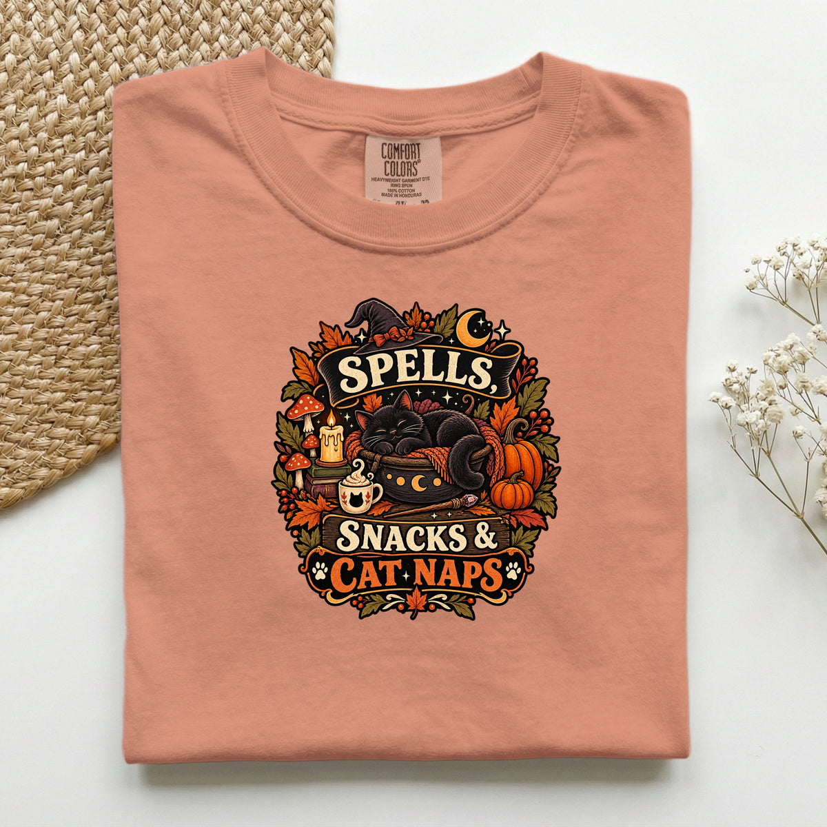 Spells Snacks & Cat Naps graphic tee in Terracotta, folded flat lay