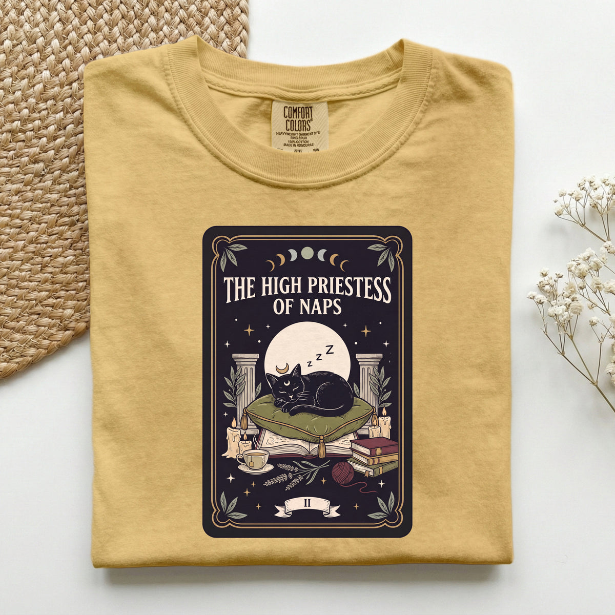 The High Priestess of Naps graphic tee in Mustard, folded flat lay