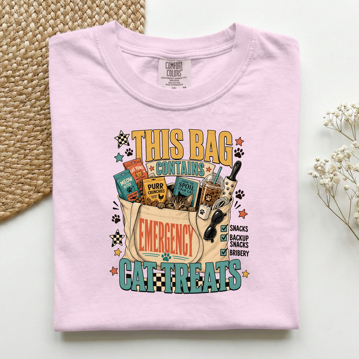This Bag Contains Emergency Cat Treats graphic tee in Blossom, folded flat lay
