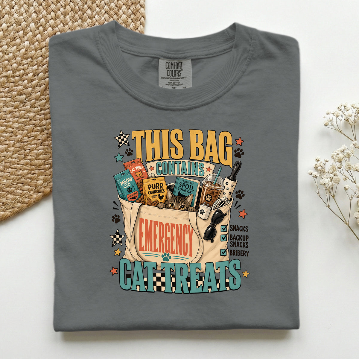 This Bag Contains Emergency Cat Treats graphic tee in Pepper, folded flat lay