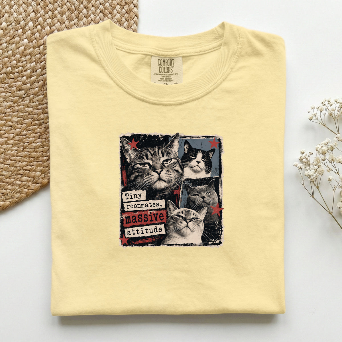 Tiny Roommates Massive Attitude graphic tee in Butter, folded flat lay