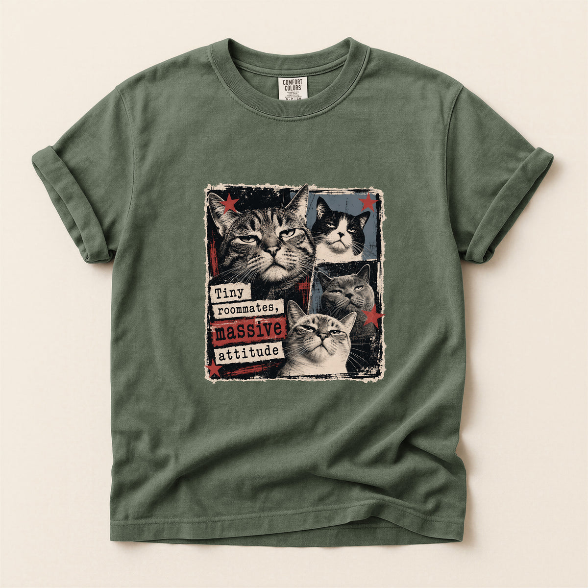 Tiny Roommates Massive Attitude graphic tee in Moss, folded flat lay