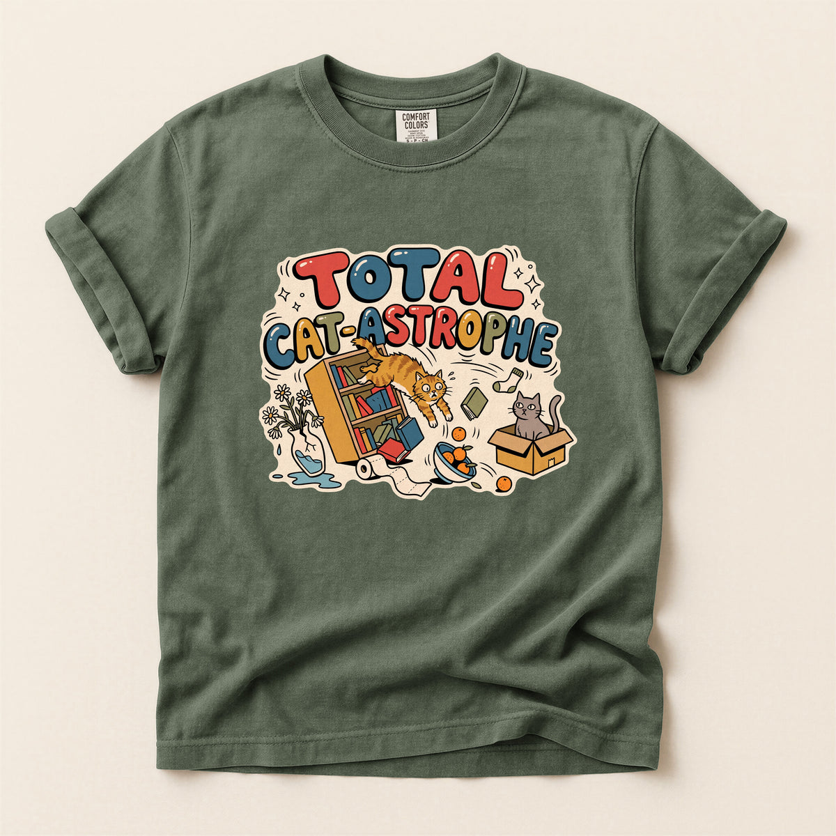 Total Cat-astrophe graphic tee in Moss, flat lay