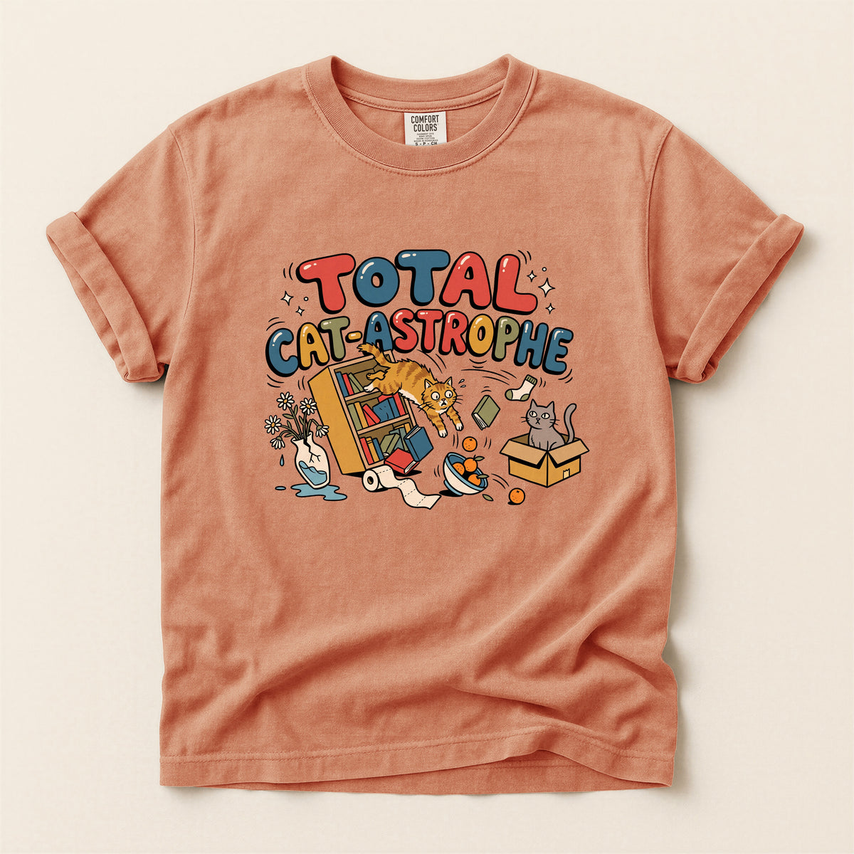 Total Cat-astrophe graphic tee in Terracotta, flat lay