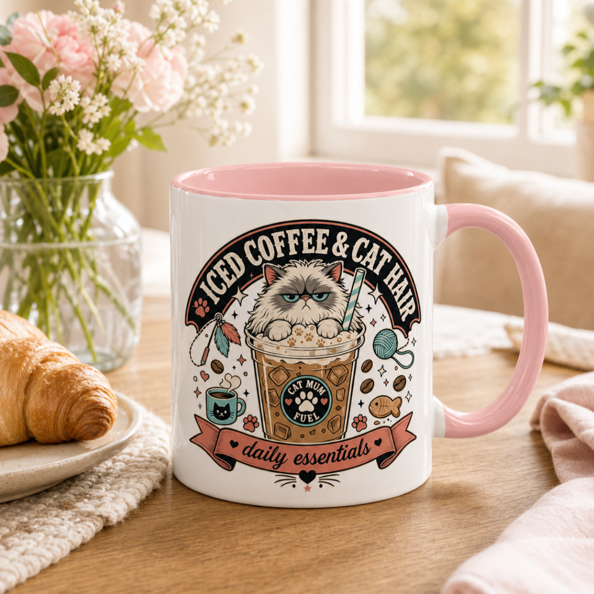 Iced Coffee & Cat Hair Cat Mum mug in Pink, styled lifestyle photo with flowers