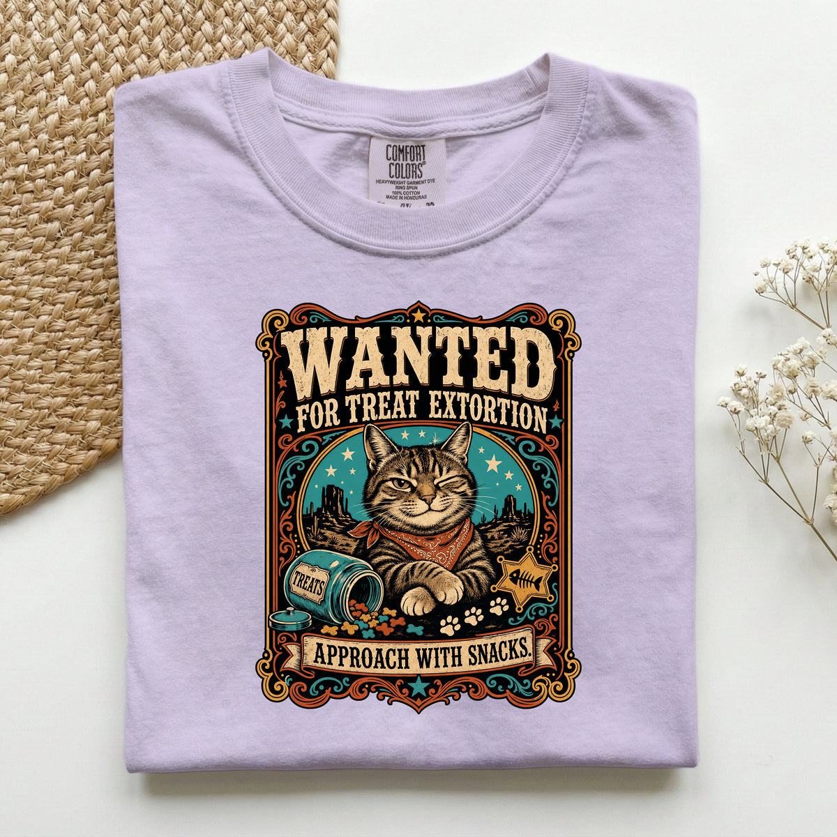 Wanted For Treat Extortion graphic tee in Orchid, folded flat lay