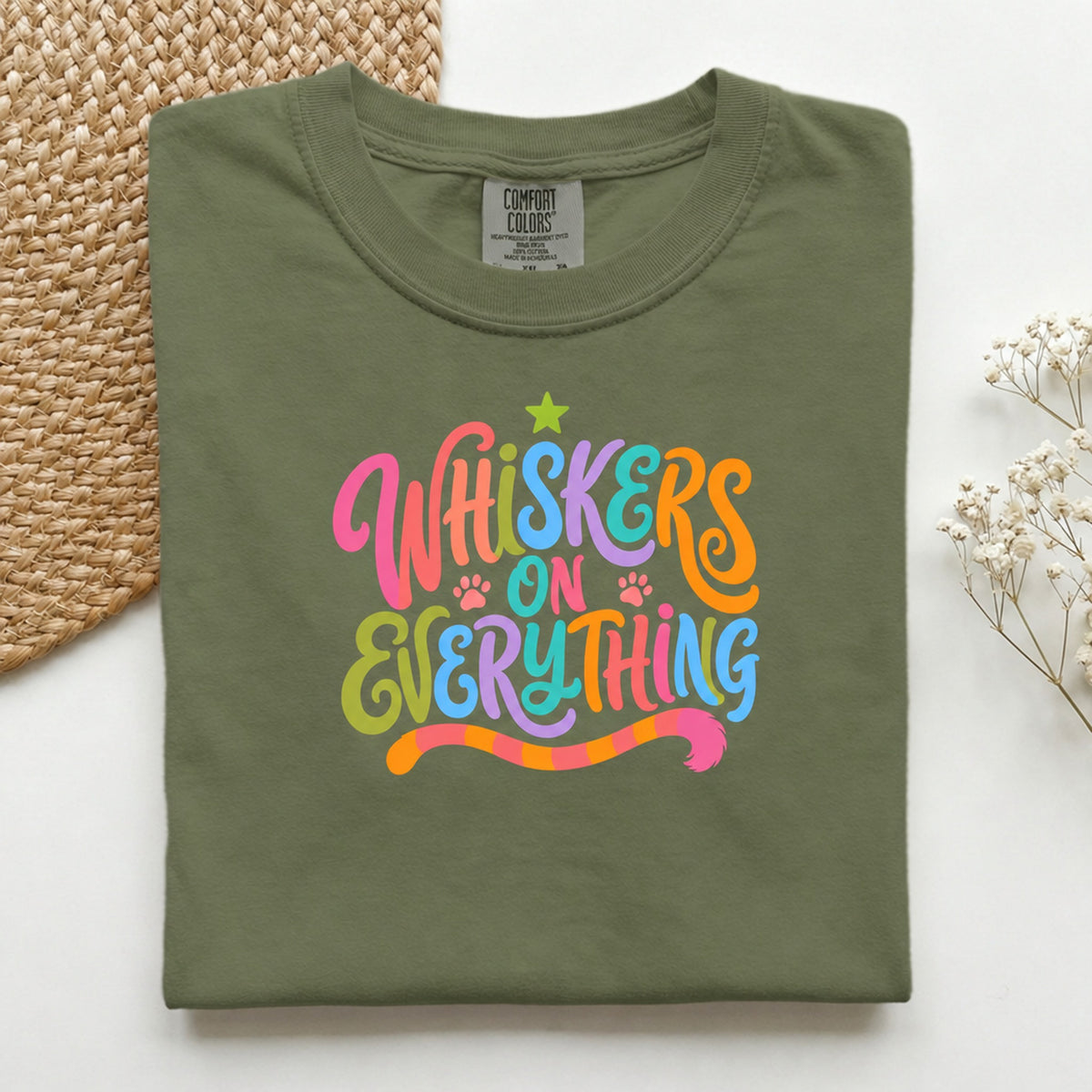 Whiskers On Everything graphic tee in Moss, folded flat lay