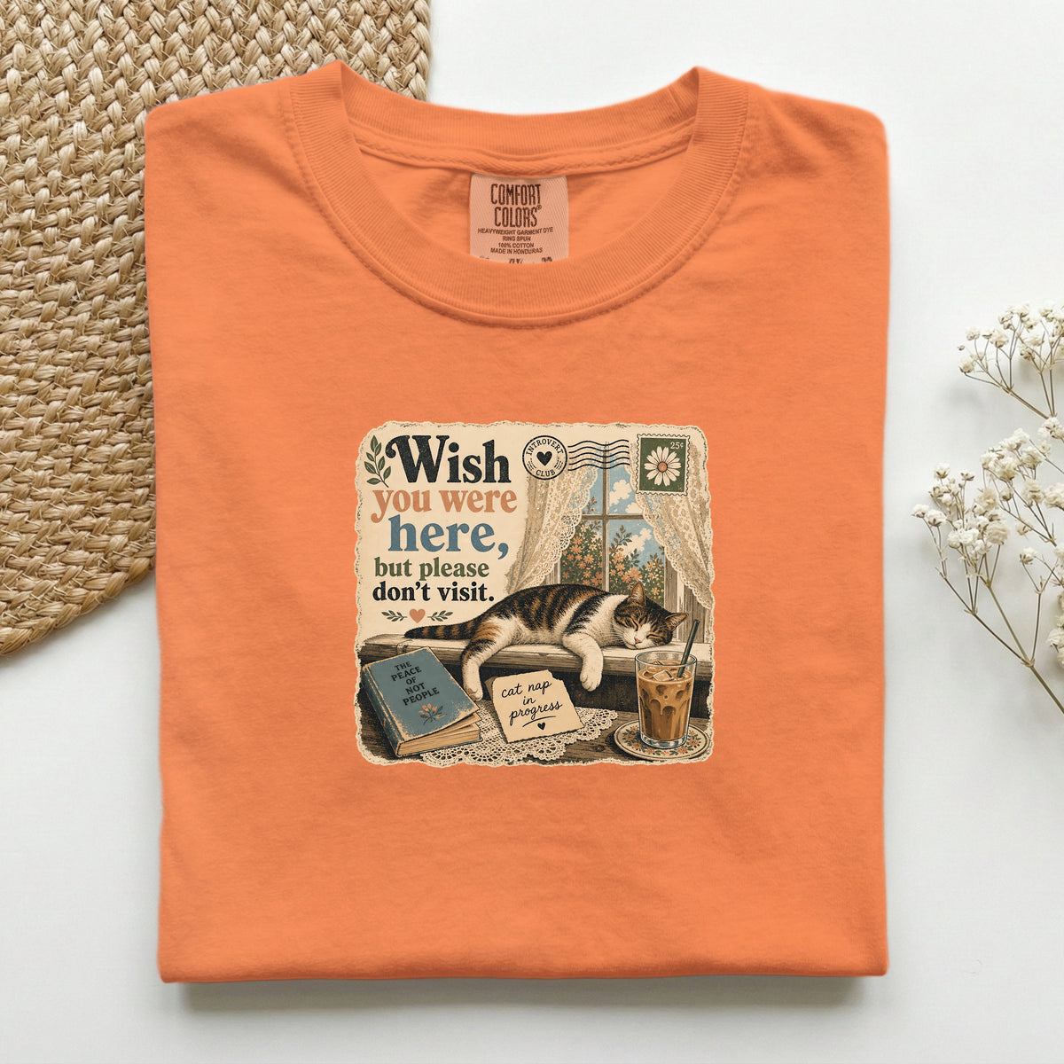 Wish You Were Here graphic tee in Burnt Orange, folded flat lay