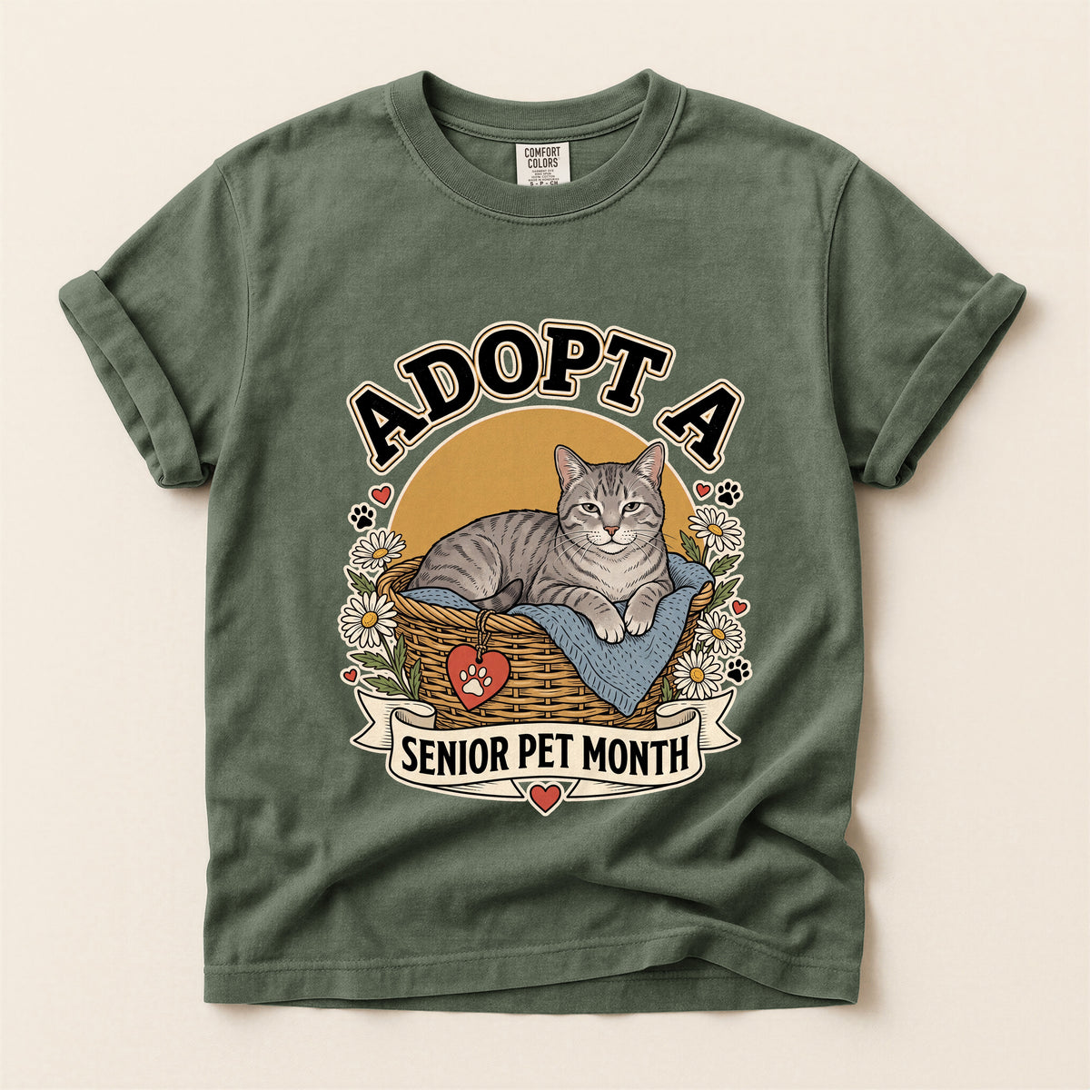 Adopt a Senior Pet Month graphic tee in Moss, flat lay