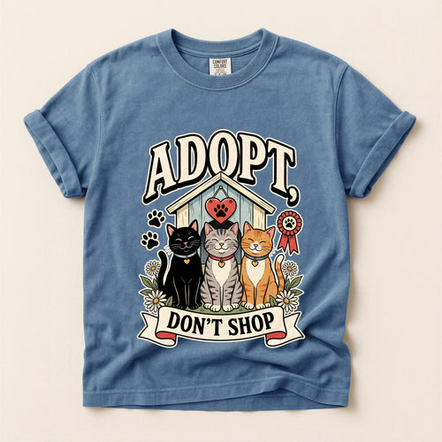 Adopt, Don't Shop graphic tee in Blue Jean, flat lay