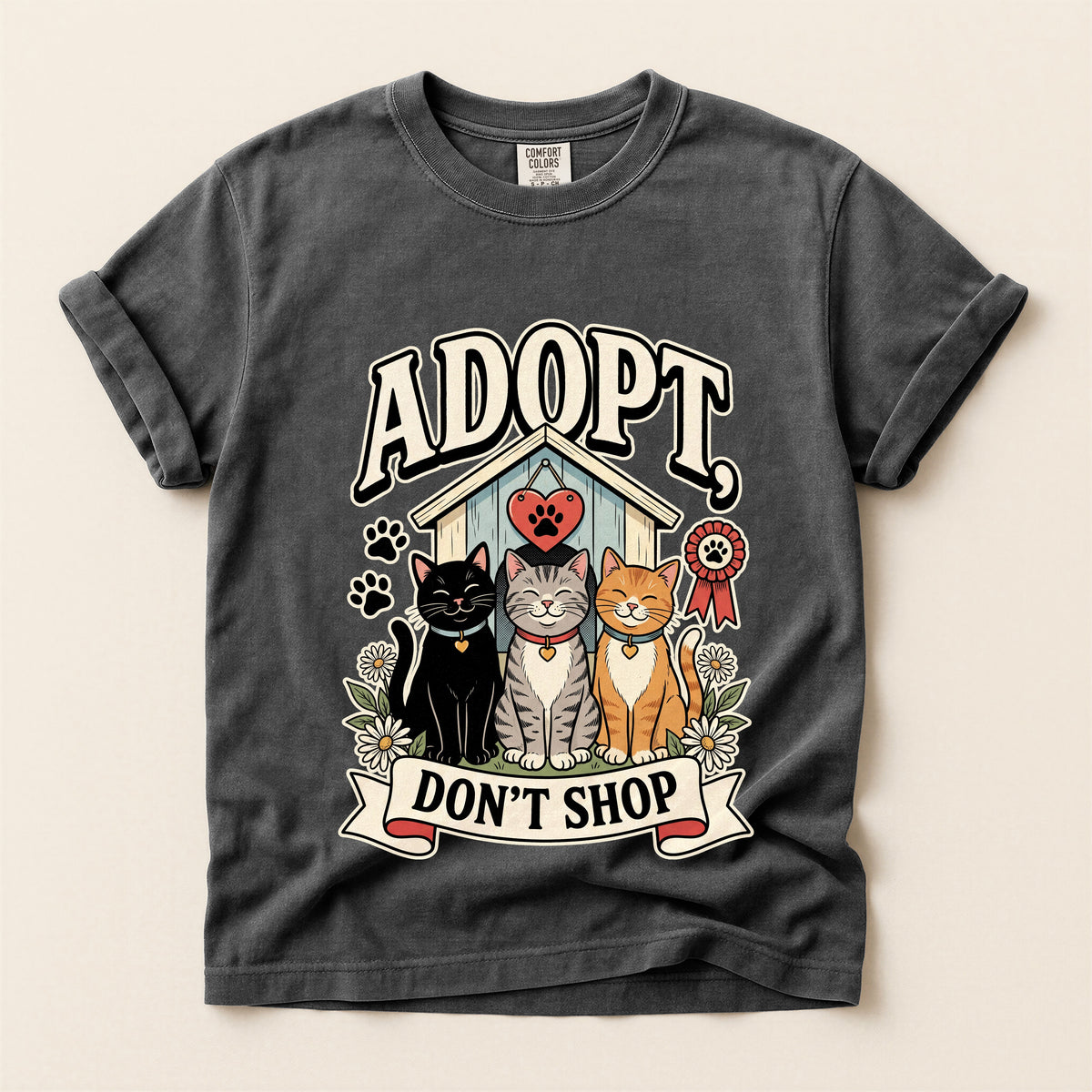 Adopt, Don't Shop graphic tee in Pepper, flat lay