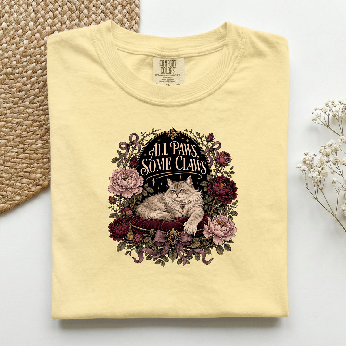 All Paws, Some Claws graphic tee in Butter, folded flat lay