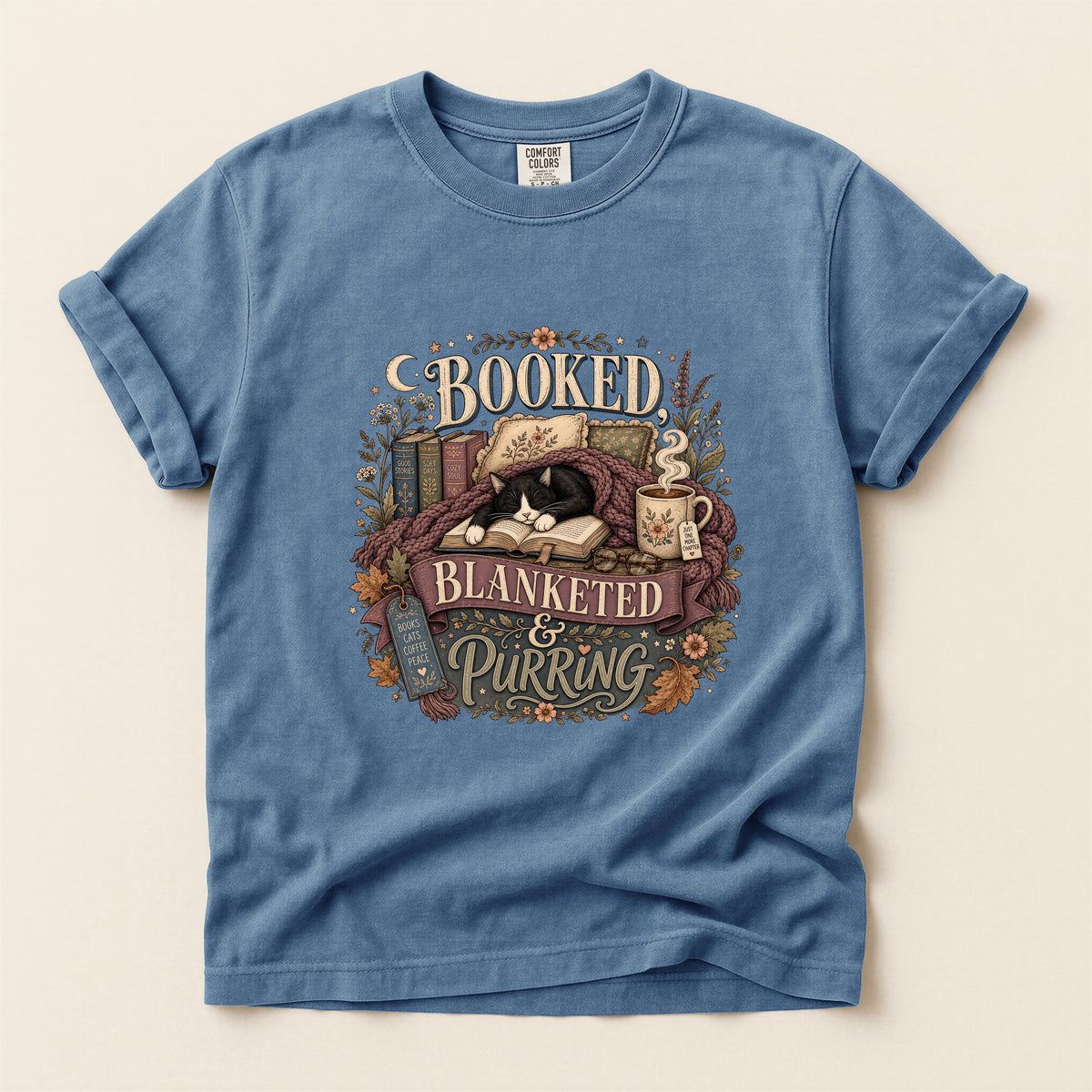 Booked Blanketed And Purring graphic tee in Blue Jean, folded flat lay
