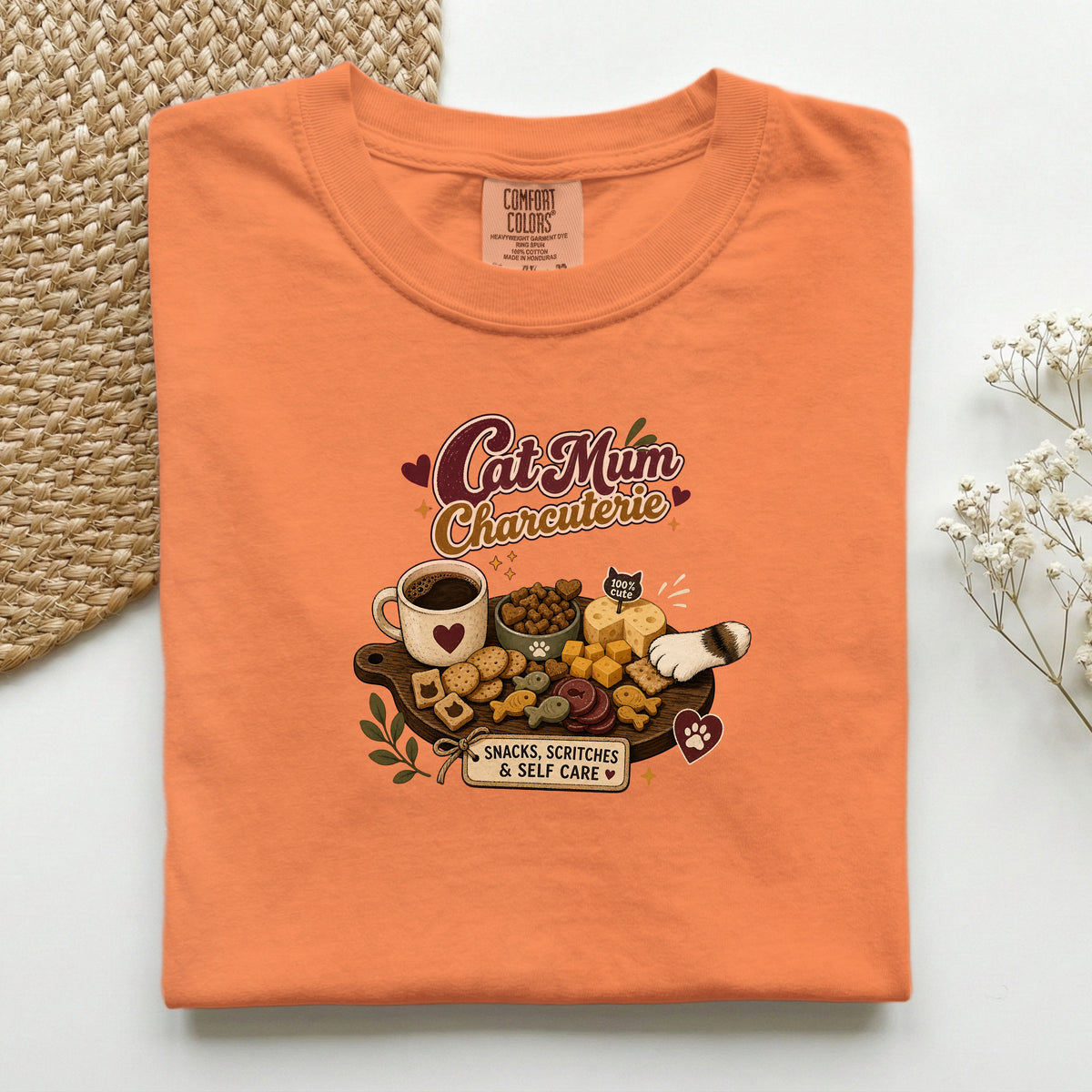 Cat Mum Charcuterie graphic tee in Burnt Orange, folded flat lay