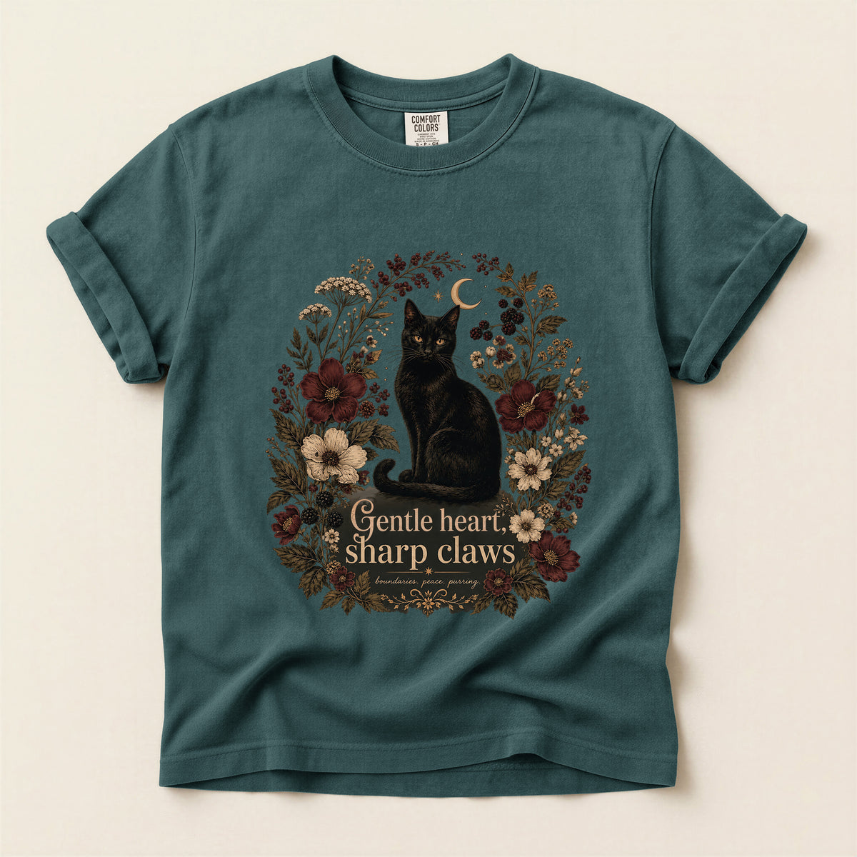 Gentle Heart, Sharp Claws graphic tee in Blue Spruce, flat lay