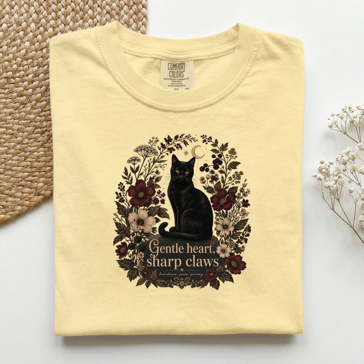 Gentle Heart, Sharp Claws graphic tee in Butter, folded flat lay