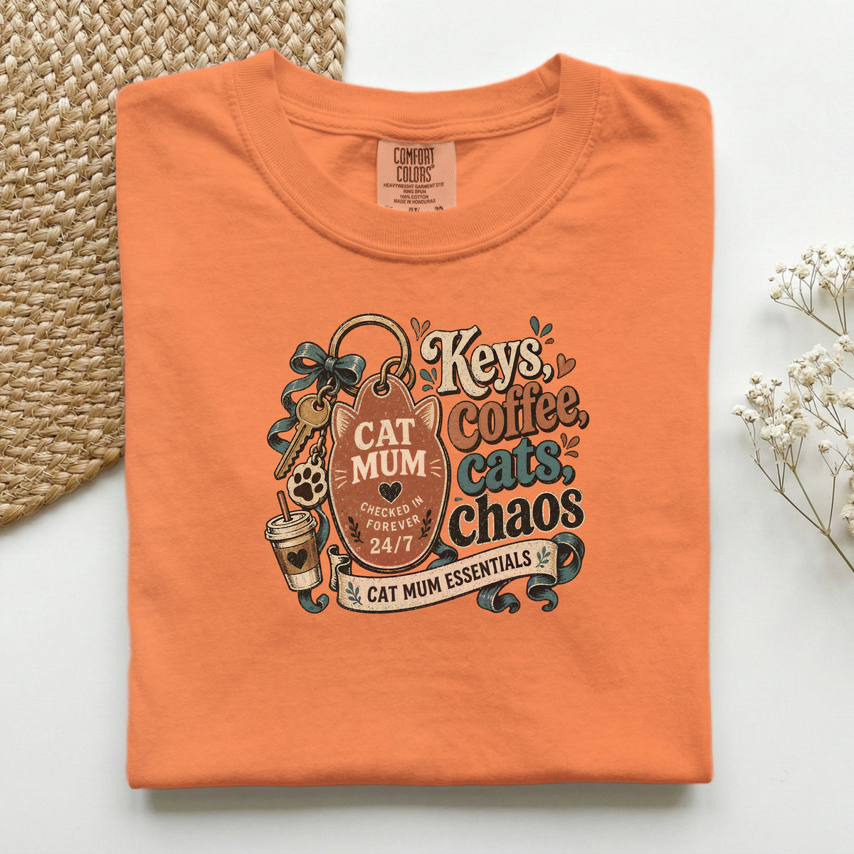 Keys, Coffee, Cats, Chaos graphic tee in Burnt Orange, folded flat lay