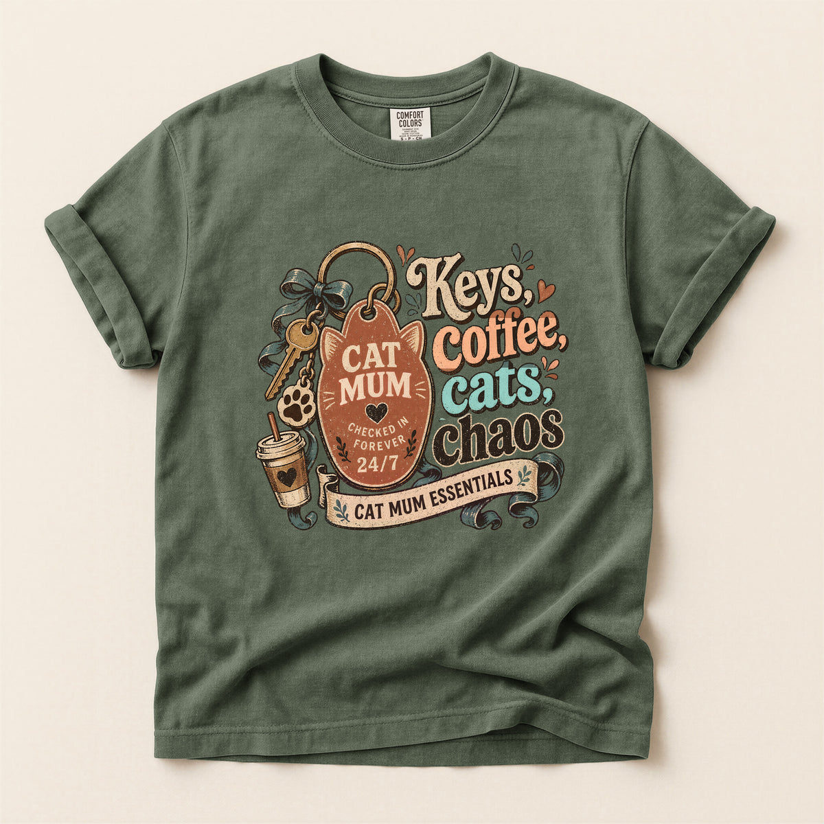 Keys, Coffee, Cats, Chaos graphic tee in Moss, flat lay
