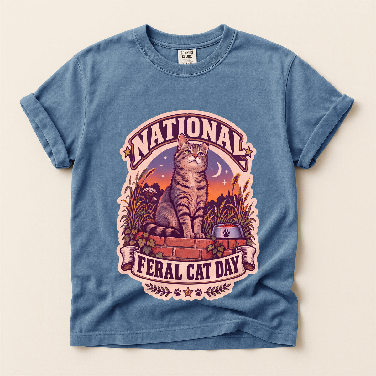 National Feral Cat Day graphic tee in Blue Jean, flat lay