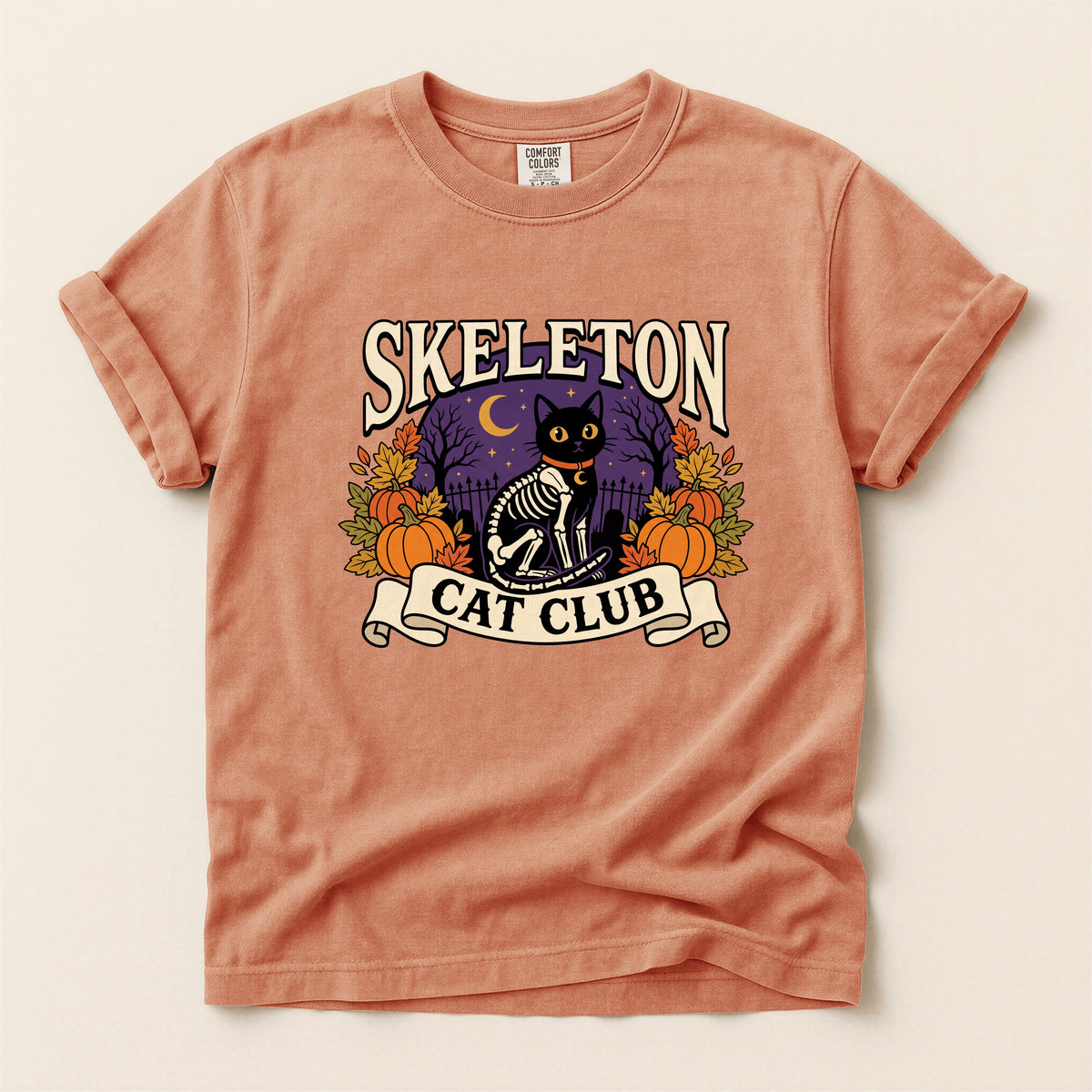 Skeleton Cat Club graphic tee in Terracotta, flat lay