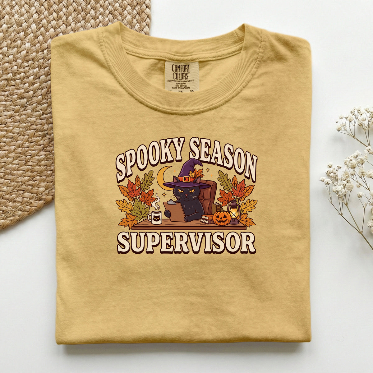 Spooky Season Supervisor graphic tee in Mustard, folded flat lay