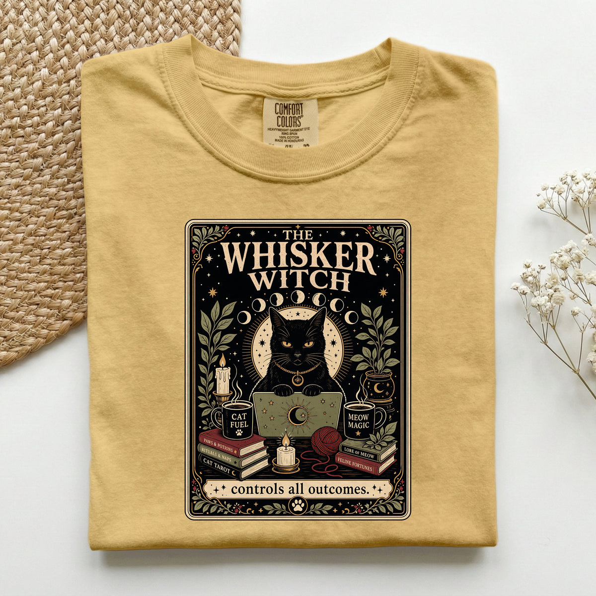 The Whisker Witch graphic tee in Mustard, folded flat lay