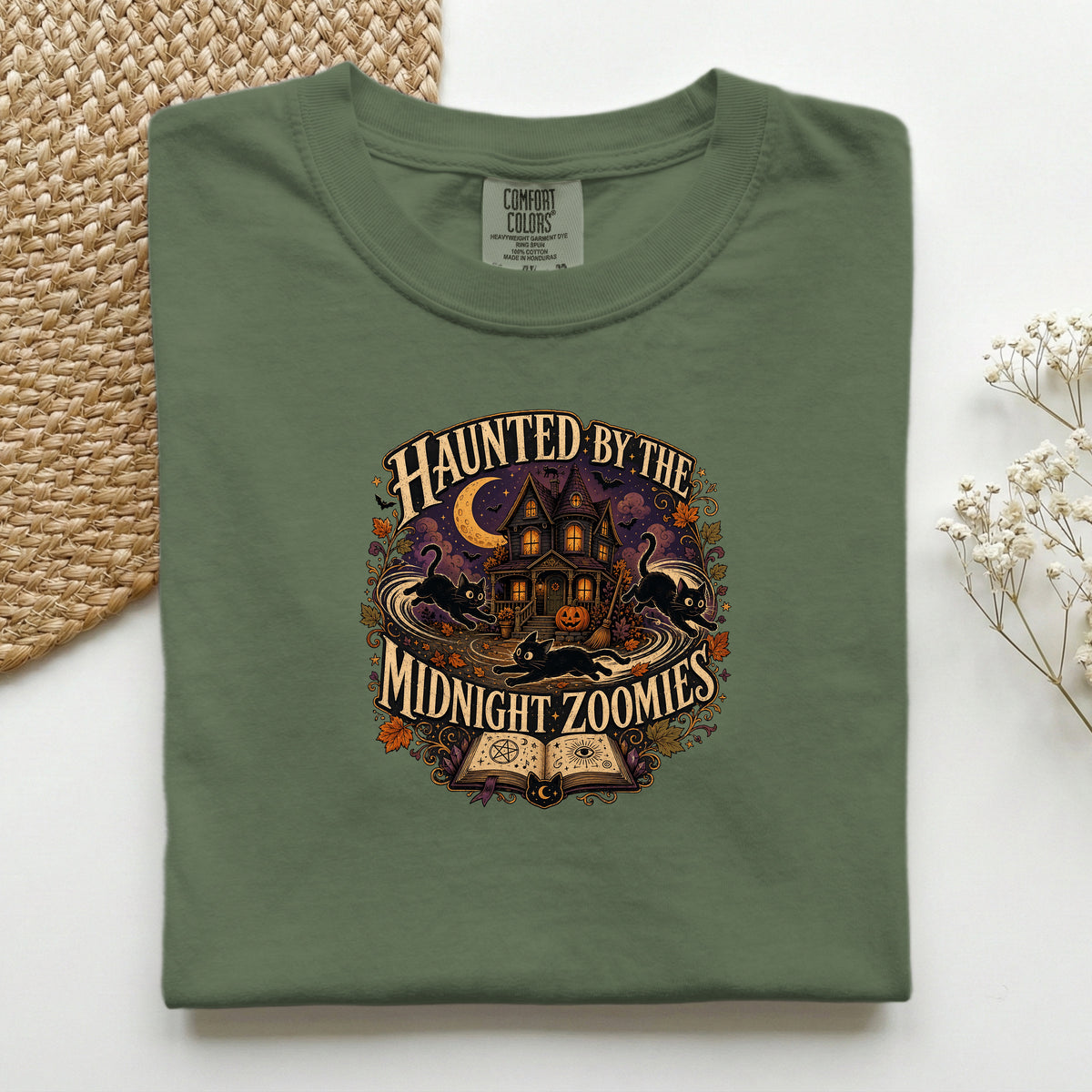 Haunted By The Midnight Zoomies graphic tee in Hemp, folded flat lay